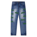 Amiri Jeans Blue Jeans Ripped Letter Embroidered Jeans